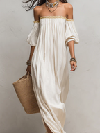 Ivory off-shoulder pleated maxi dress with smocked top and wide flowy skirt
