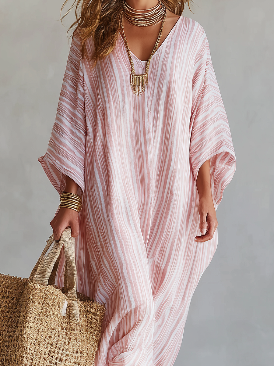 Soft pink striped kaftan dress neckline with V opening and gold-toned pendant detail