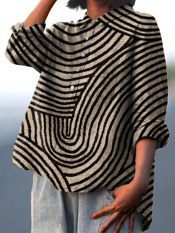 Women's casual shirt close-up, black-and-cream circular line print, three-quarter sleeves