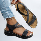 Black orthopedic comfort sandals with crisscross strap and two buckle closures