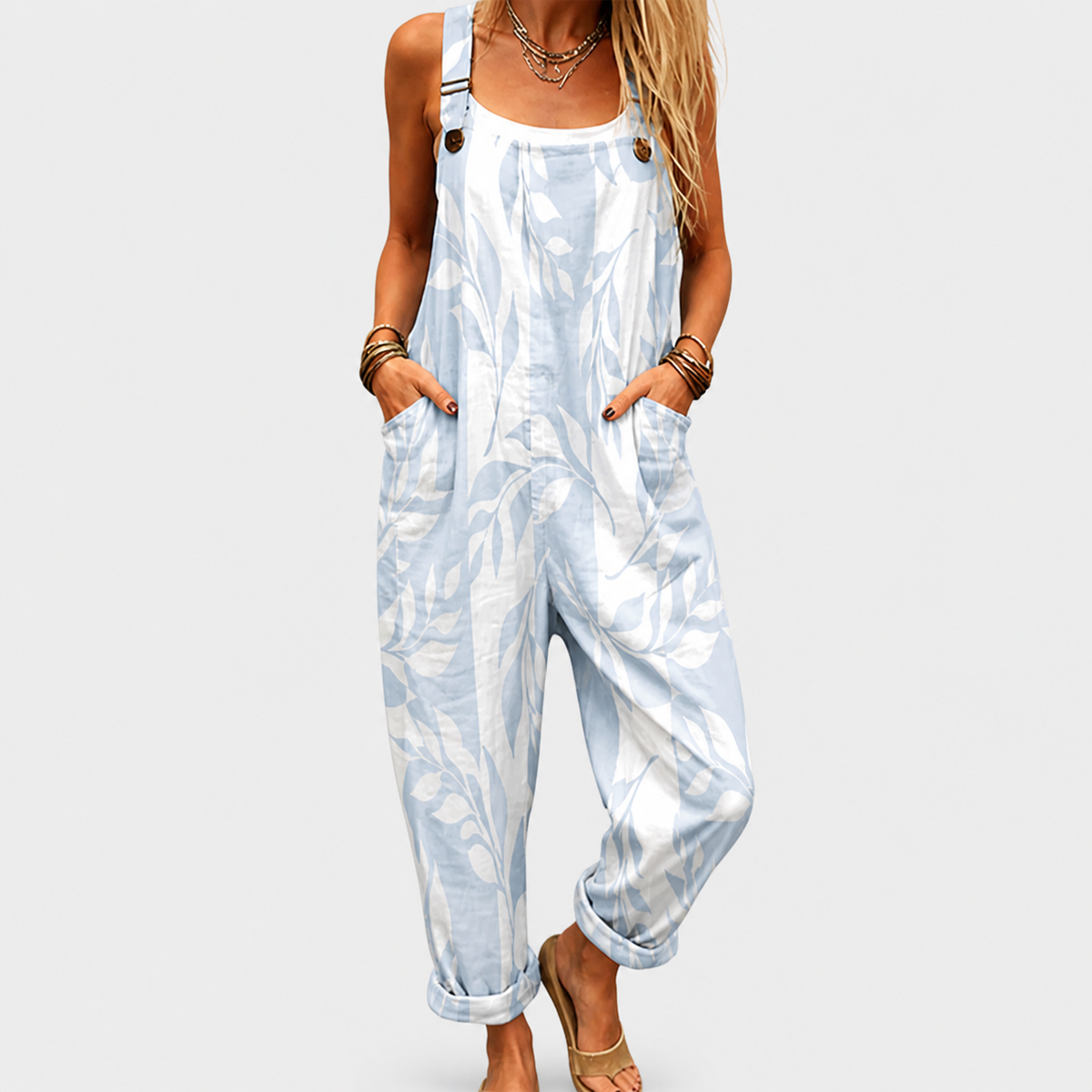 Light blue and white printed sleeveless jumpsuit with side pockets