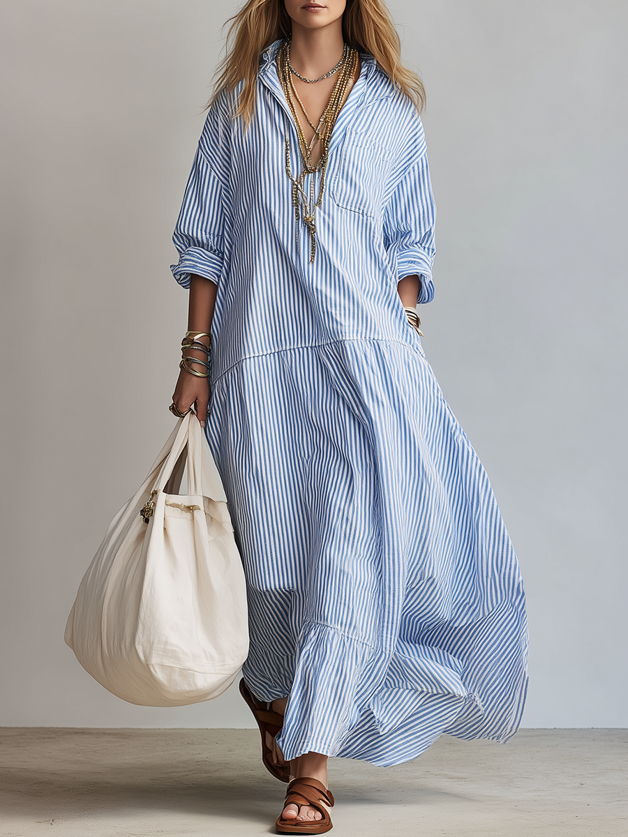 Blue and white striped maxi shirtdress with V-neck and button front, tiered skirt