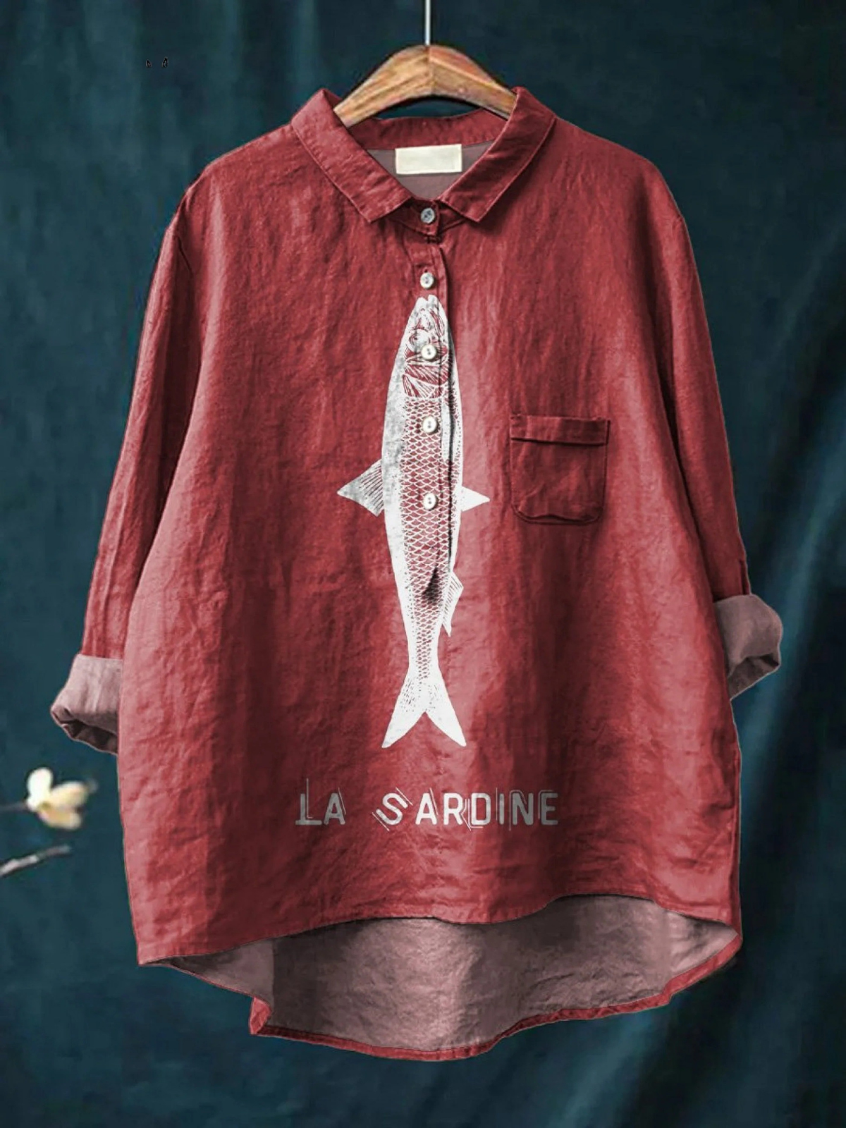 Red women's casual button-up shirt with sardine graphic and chest pocket.