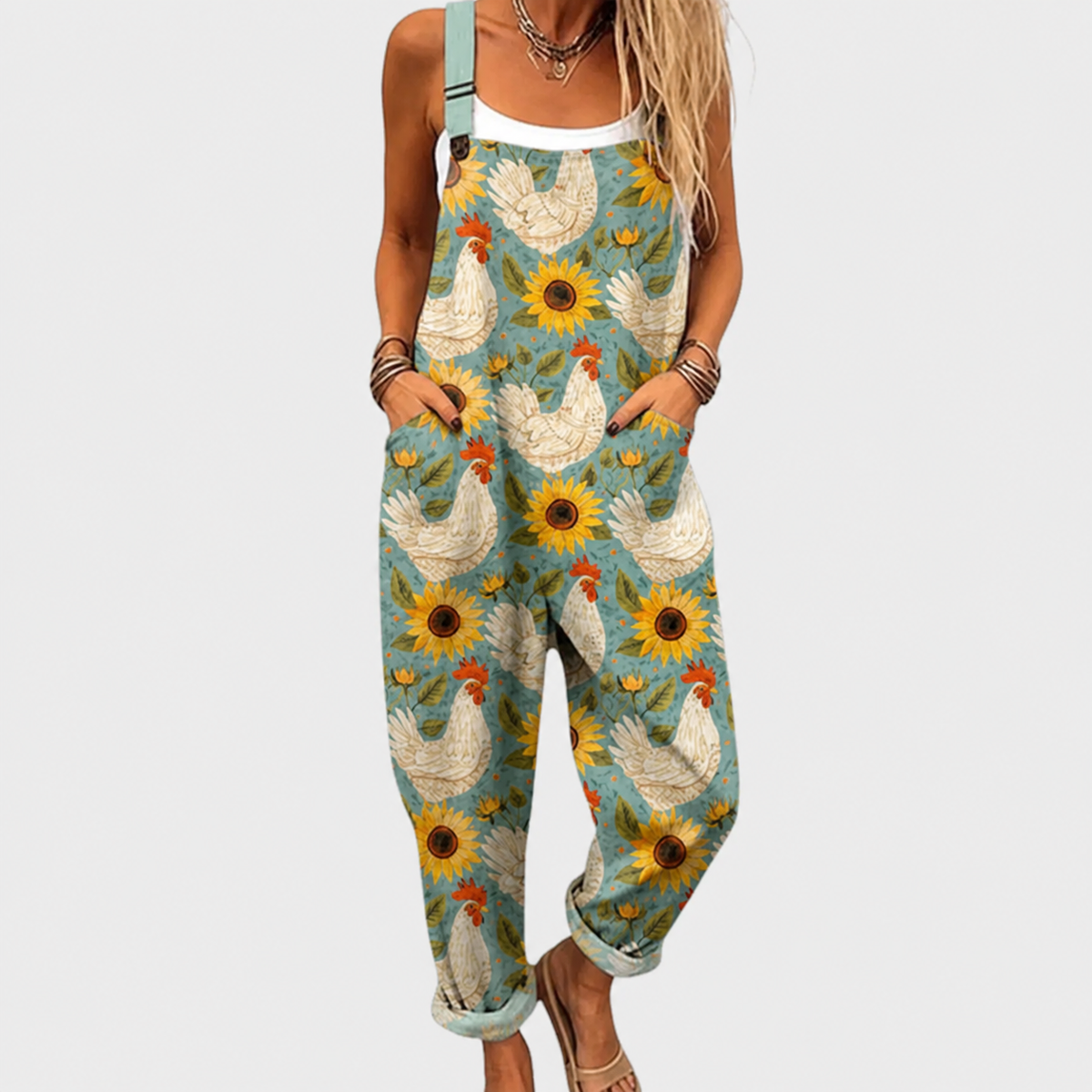 Sleeveless printed jumpsuit with sunflower and leaf pattern