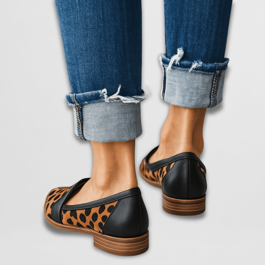 Soft comfort support loafers in black with leopard-print inset and low stacked heel