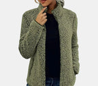 Green teddy jacket with full-zip front and stand collar, long sleeves.