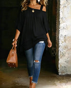 Black asymmetric blouse with draped hem and relaxed short sleeves