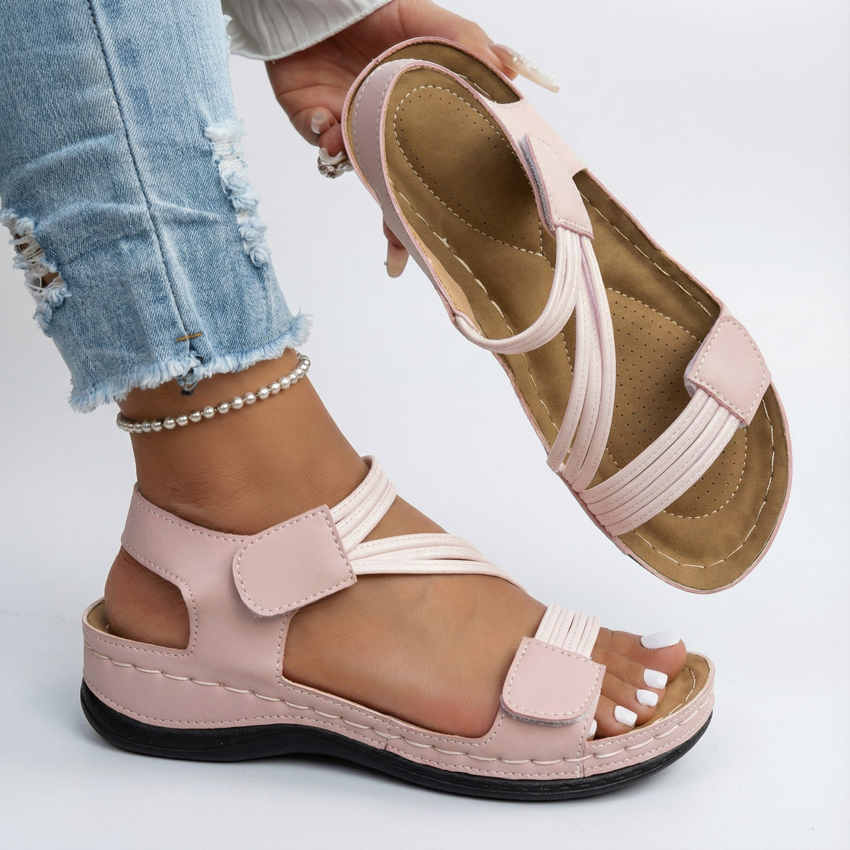 Pink orthopedic comfort sandals with adjustable ankle strap and two toe loops