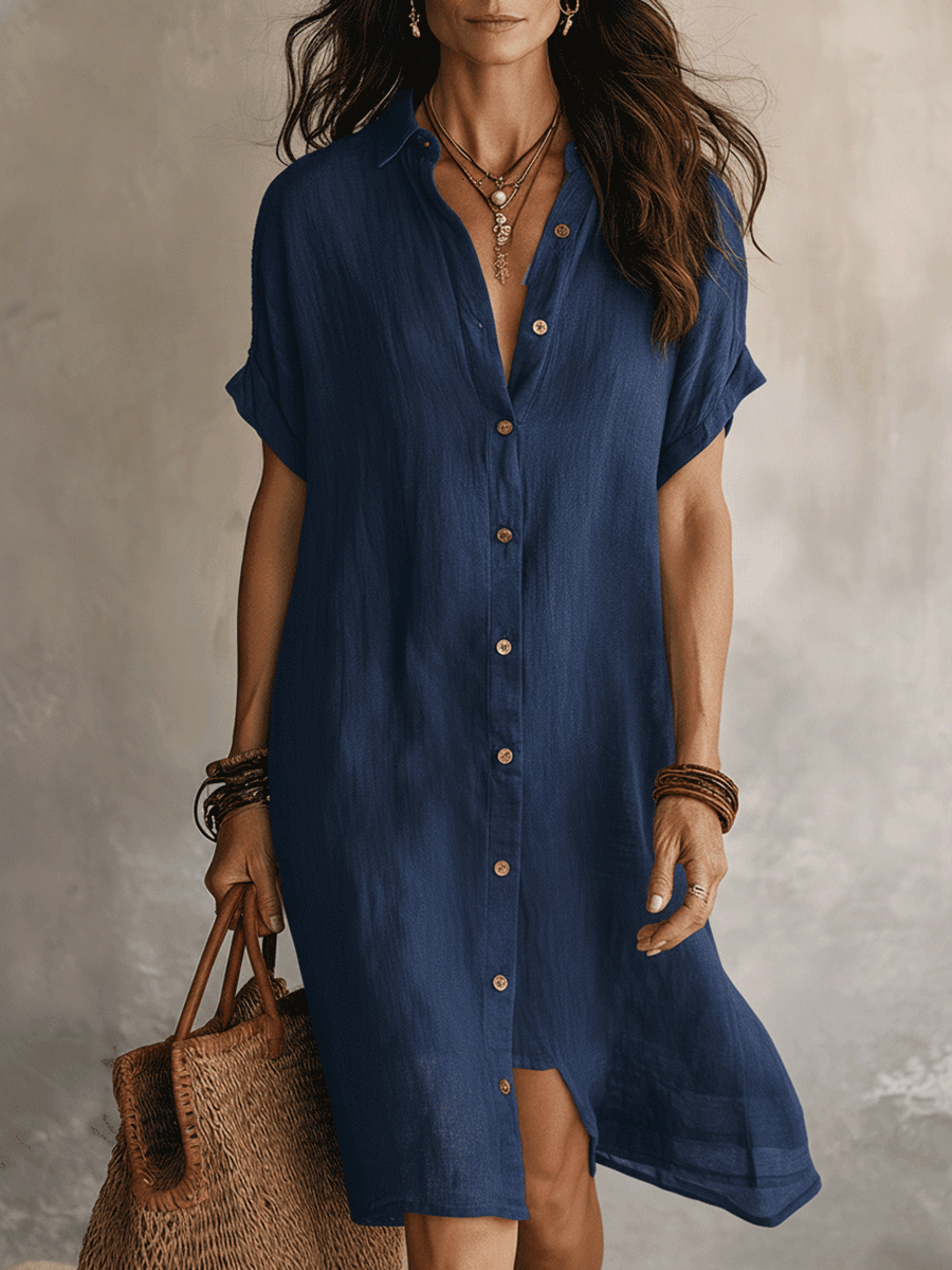 Blue linen relaxed midi dress with short sleeves, V-neck, and center button front