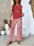 Red sleeveless layered top and striped wide-leg pants two-piece set
