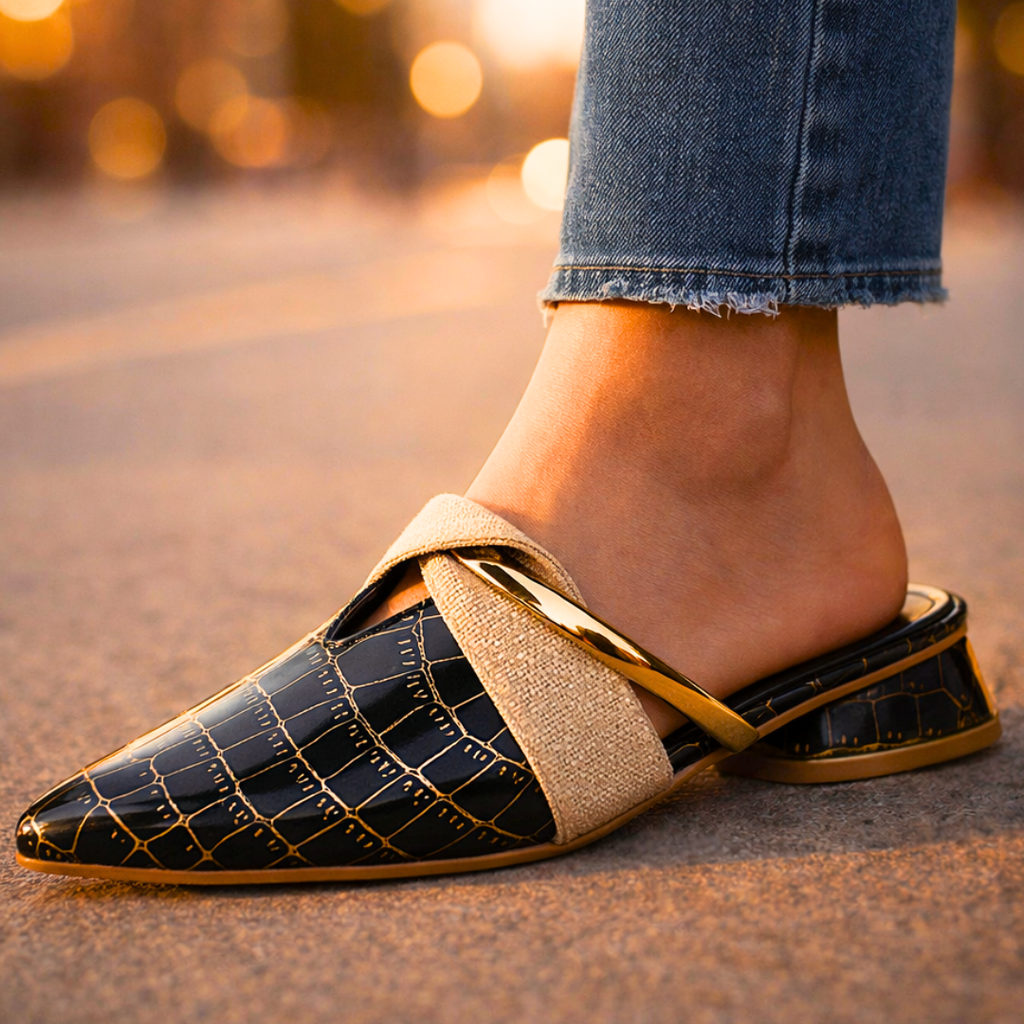 Black gator-pattern slip-on shoe with beige fabric strap and gold accent block heel