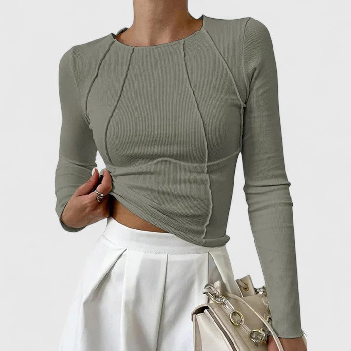 Gray-green ribbed knit long-sleeve top with round neck and draped asymmetrical hem