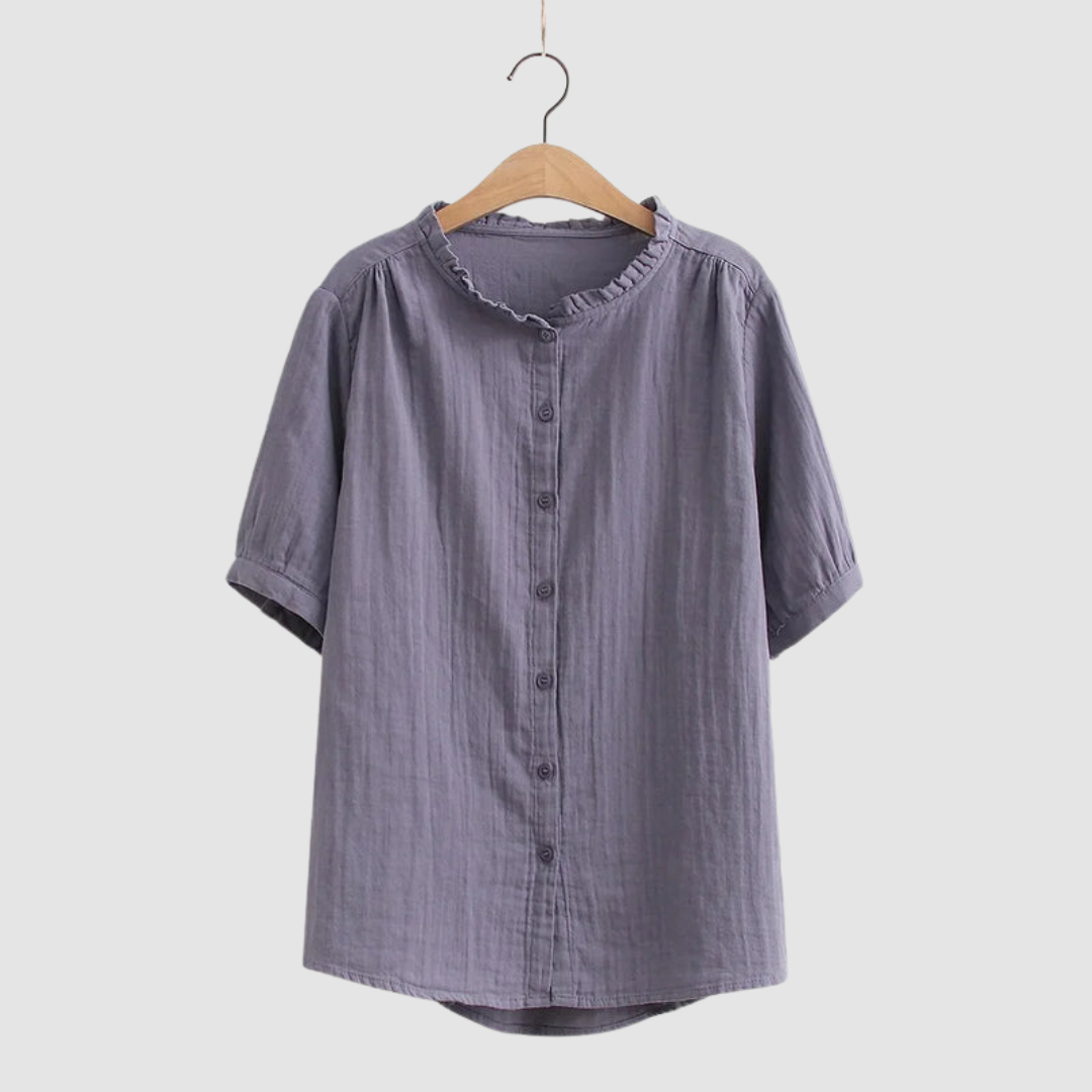 Lightweight cotton shirt in slate purple, short sleeves, button front, ruffled crew neck.
