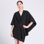 Black caped fleece shawl with V-neck and waist tie, oversized poncho drape.