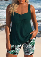 Turquoise cross-body tankini with V-neck knit top and green-and-black patterned shorts
