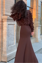 Brown ruffle long-sleeve top and ribbed mermaid maxi skirt set, side-angled view
