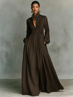 Women's dark brown long-sleeve maxi dress with stand-up collar, button-front and patchwork