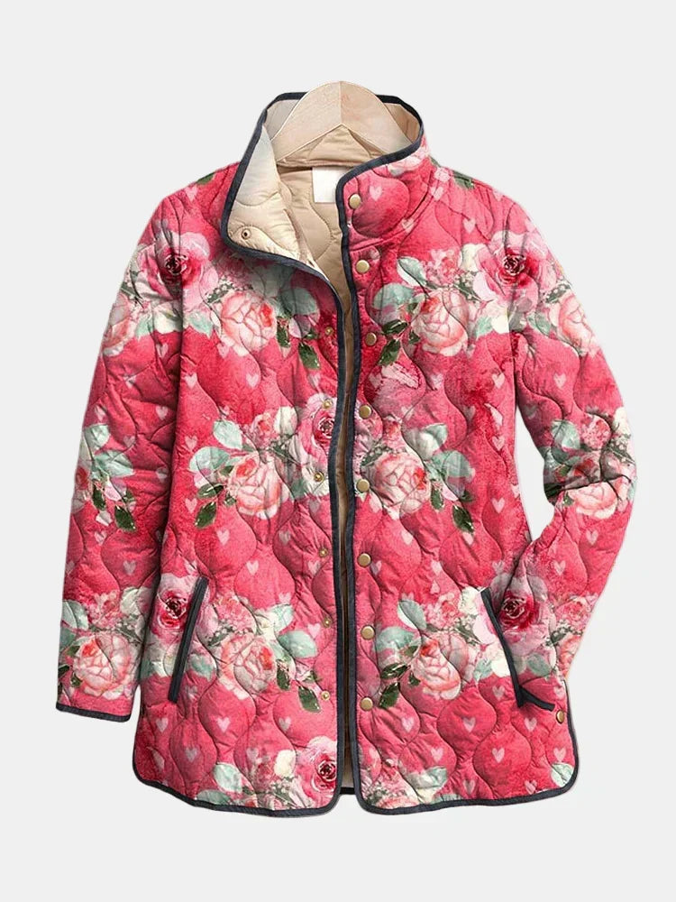 Pink floral quilted jacket with hood, zip front and snap buttons