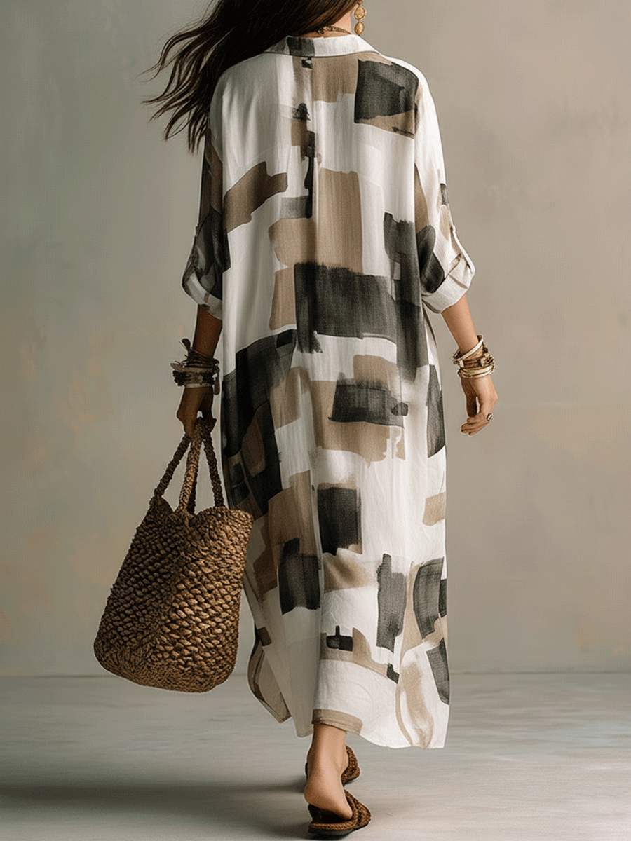 Off-white button-front maxi dress with abstract block print, relaxed fit, flowy 3/4 sleeves
