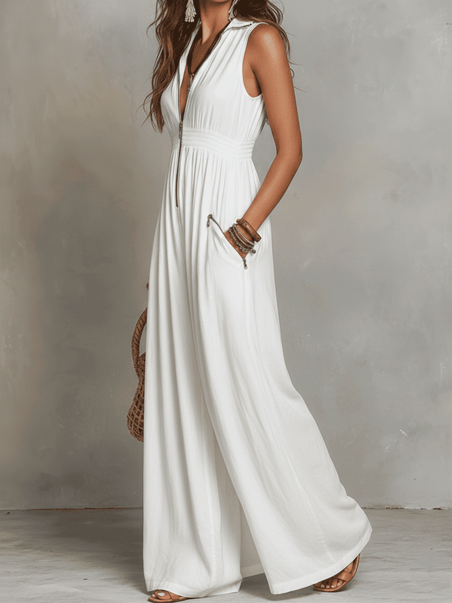 White sleeveless maxi dress with V-neck and front zip, billowy skirt