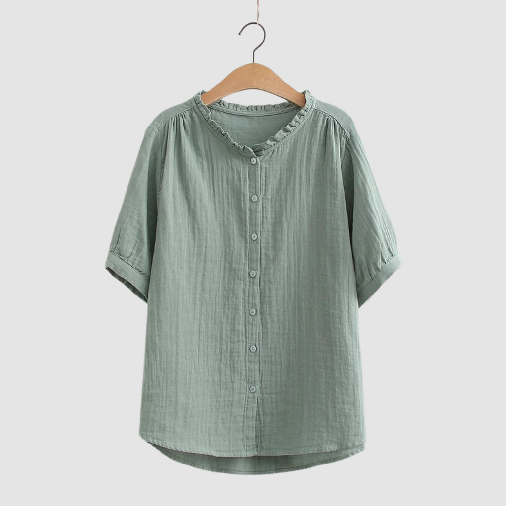 Lightweight cotton shirt in green, short sleeves, button front, ruffled crew neck.