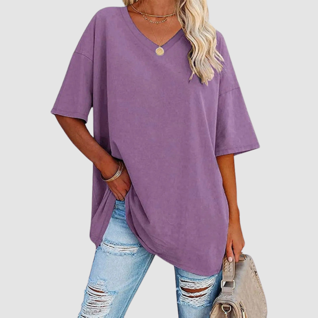 Purple V-neck t-shirt with short sleeves, loose drape and side-tuck detail.