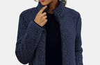 Navy teddy jacket close-up with full-zip front and textured fleece fabric.