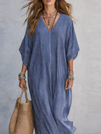Blue pinstripe maxi caftan dress with V-neck and wide sleeves