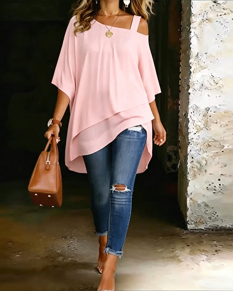 Pink asymmetric blouse with draped hem and wide shoulder straps