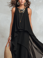 Black sleeveless layered chiffon maxi dress with draped tiered hem, scoop neckline