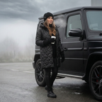 Black quilted hooded coat with full-length zipper and long sleeves