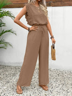 Tan sleeveless two-piece set with ruffled shoulder top and wide-leg pants