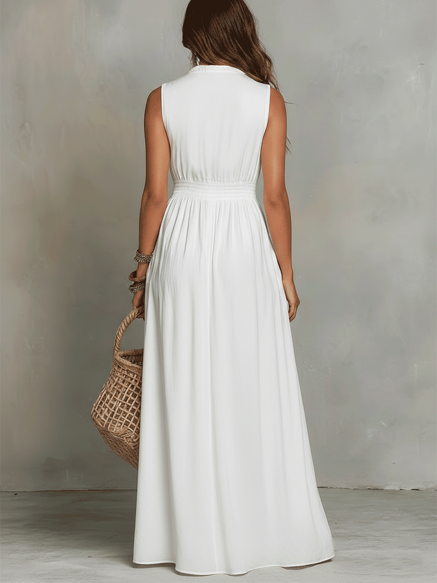 White zip-front sleeveless maxi dress, back view with gathered waist