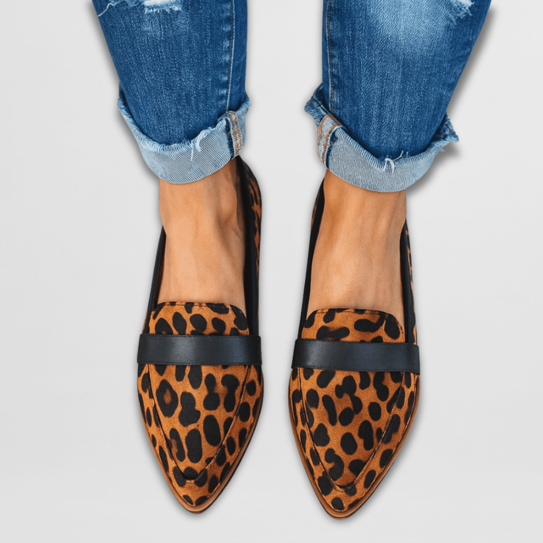 Soft comfort support loafers in leopard print with black strap and low sole