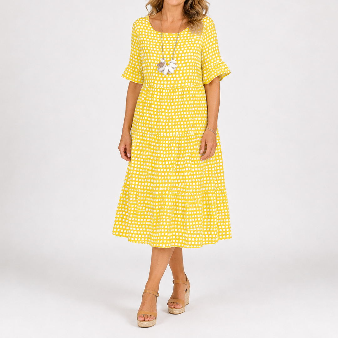 Yellow polka dot short-sleeve midi dress with a tiered skirt