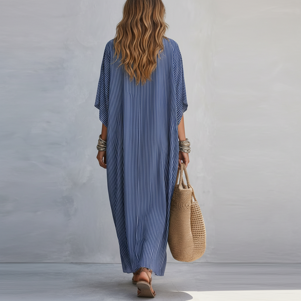 Blue pinstripe maxi dress, back view with loose fit and wide three-quarter sleeves