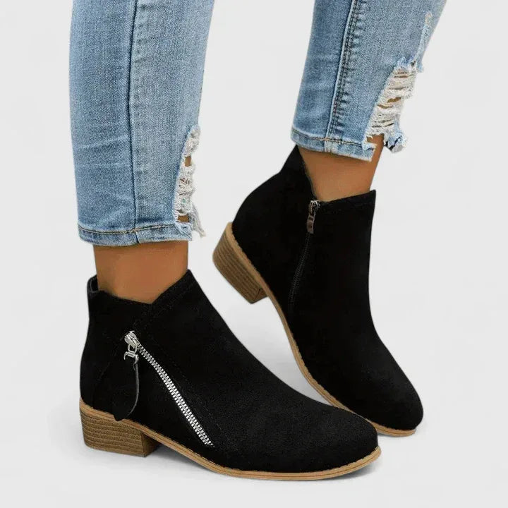 Black suede orthopedic ankle boots with side zipper and low block heel