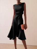 Sleeveless black midi A-line dress with waist twist and flared skirt