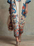 Ivory caftan midi dress with blue and red floral paisley, straight hem and ankle-length
