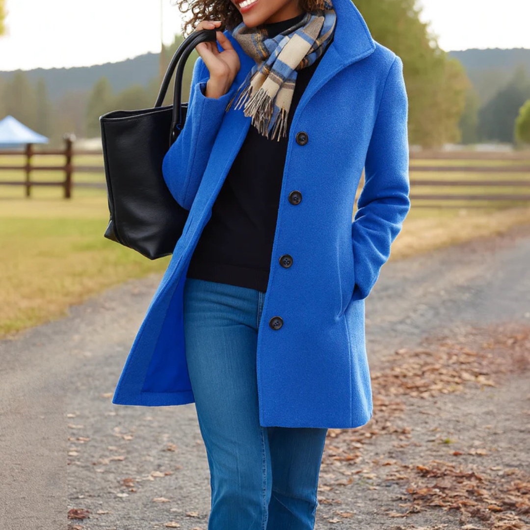 Blue long coat with notched lapels, button front, and flap pockets, lined.