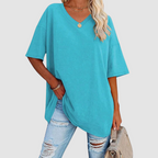 Teal V-neck t-shirt with short sleeves, loose drape and side-tuck detail.