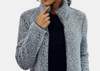 Grey textured teddy jacket close-up, stand collar and zip