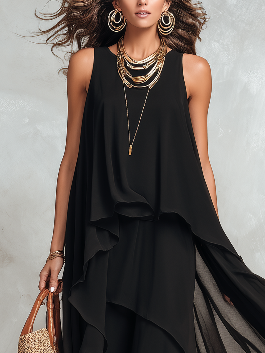 Black sleeveless layered chiffon maxi dress with layered drape and sleeveless top
