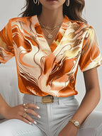 Marble print short sleeve shirt, orange and cream with gold swirls, V-neck