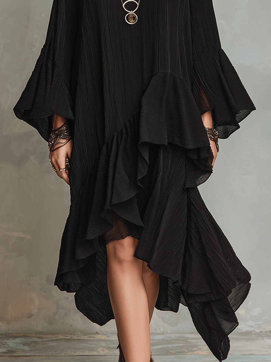 Black boho midi dress hem with asymmetric tiered ruffle layers and airy drape