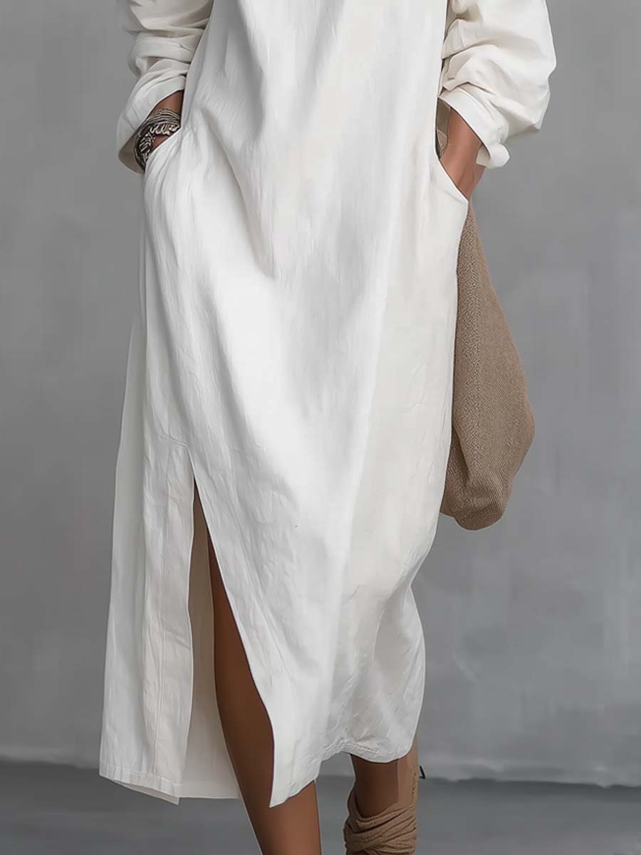 White midi one-shoulder dress with deep side split and flowing long sleeves