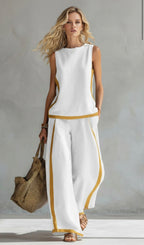 Two-piece set, light blue sleeveless top and wide-leg pants with gold trim