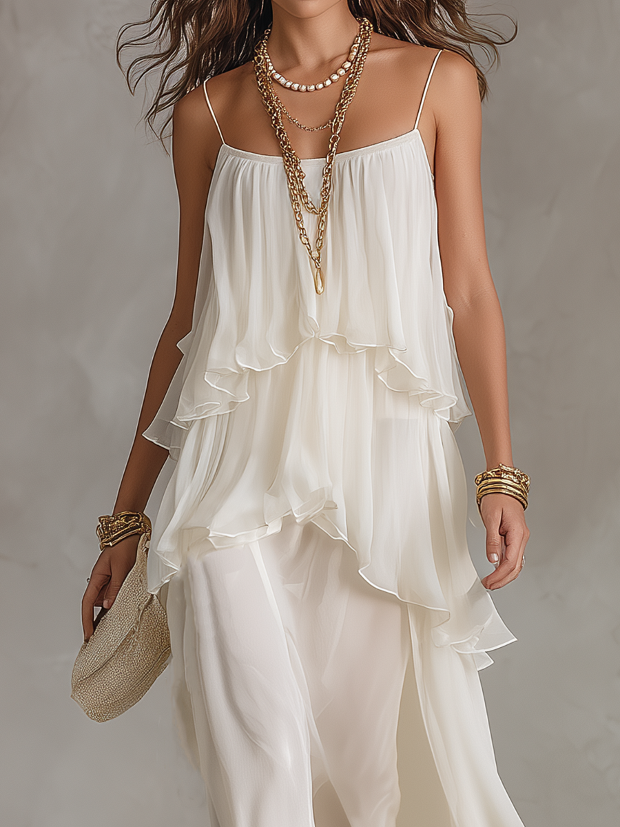 White tiered chiffon maxi dress with ruffled front bodice and layered skirt