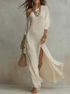 Soft ivory one-shoulder textured maxi dress with long sleeves and side slit
