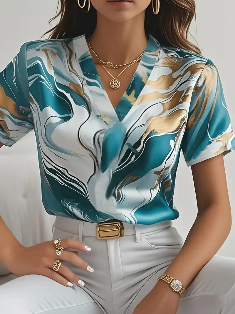 Marble print short sleeve shirt, blue and cream with gold accents, V-neck